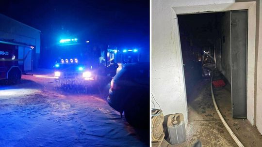 zdjęcie przedstawia samochód straży pożarnej i strażacy w korytarzu