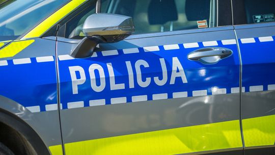 drzwi radiowozu z napisem policja w gorlicach