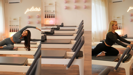 Zdjęcie przedstawia kobiety ćwiczące pilates na reformerze