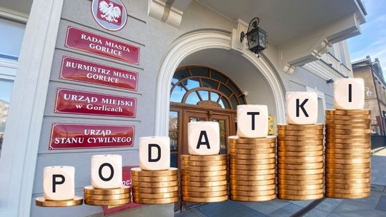 monety z klockami na górze, pisze na nich podatki