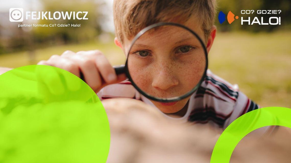 Zdjęcie przedstawia dziecko z lupą