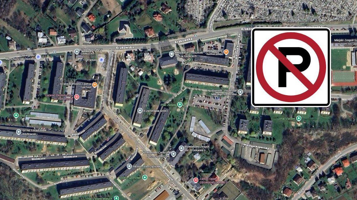 zdjęcie przedstawia widok z drona na miasto, obok grafika zakaz parkowania