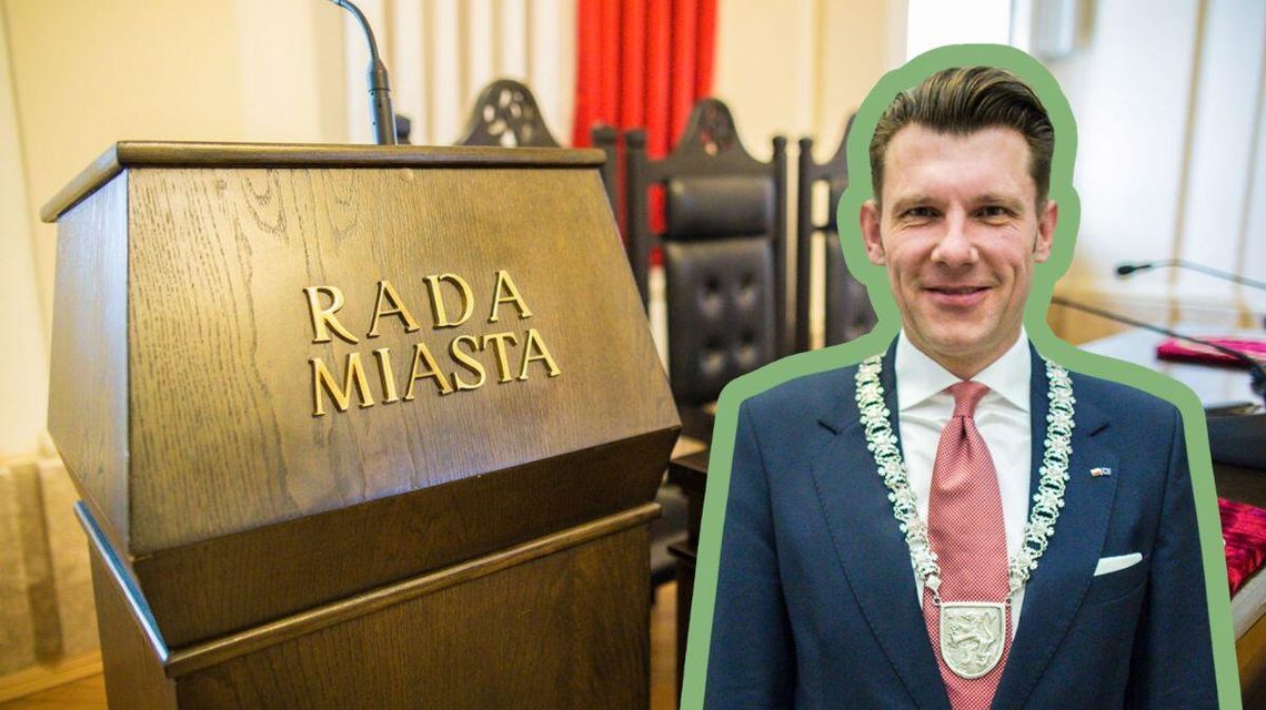 zdjęcie przedstawia mężczyznę pod krawatem i w łańcuchu urzędniczym